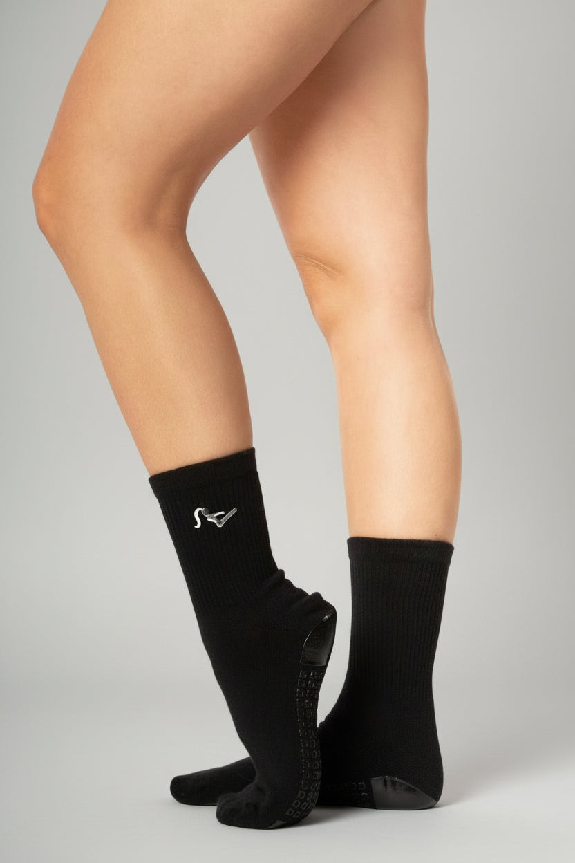 Black Pilates Yoga socks with Grip soles with image of woman in teaser position